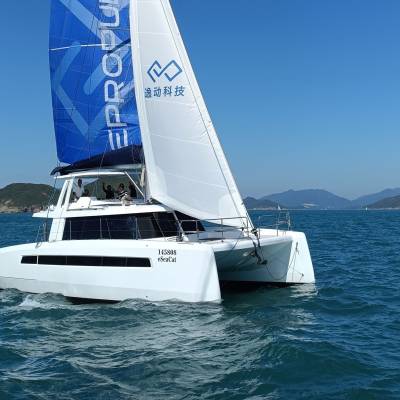 A catamaran powered by ePropulsion 96v eSSA POD Drive electric motors